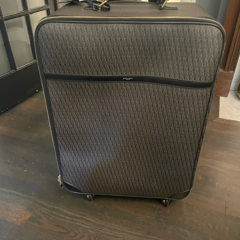 YSL Saint Laurent paris travel luggage trolley 360 wheels travel in style Italy